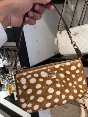 Coach Nolita 19 purse with deer print